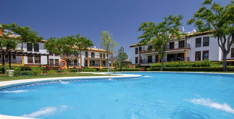 Casa de férias para 6 pessoas, com Jardim e Piscina infantil em Urbanizacion Costa Esuri