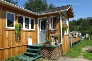 Location de vacances pour 10 personnes, avec jardin et terrasse dans Tadoussac