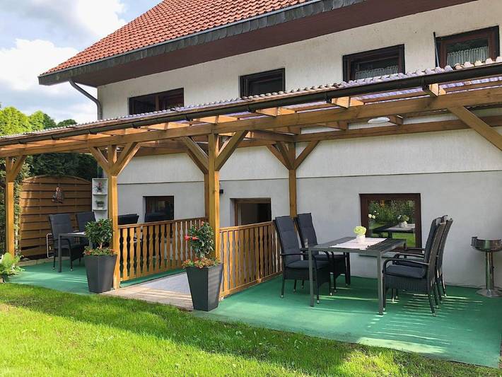 Ferienwohnung für 4 Personen, mit Terrasse und Garten sowie Ausblick in Petersdorf (Müritz)