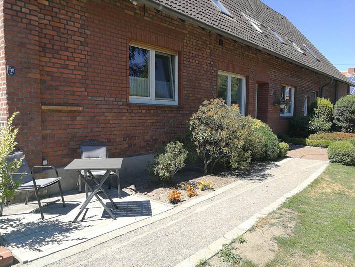 Ferienwohnung für 3 Personen, mit Terrasse und Garten sowie Ausblick