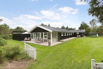 Ferienhaus für 8 Personen, mit Garten und Whirlpool sowie Sauna und Terrasse, kinderfreundlich in Grønhøj Strand