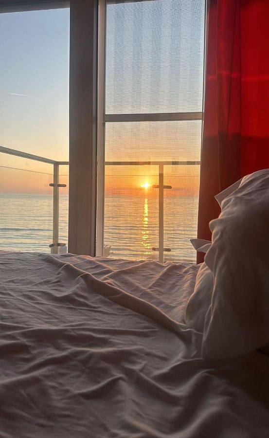 Appartement de vacances pour 2 personnes, avec jardin ainsi que vue sur le lac et vue, adapté aux familles