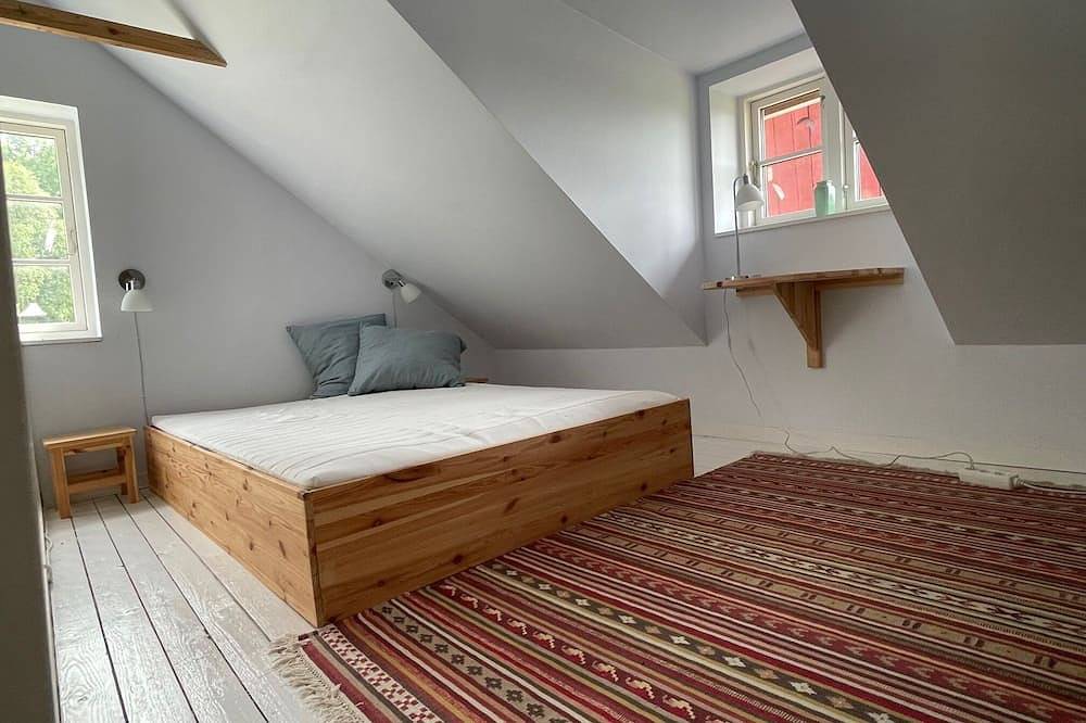 Nice farm apartment with terrace and garden right next to forest and river. in Kronoberg