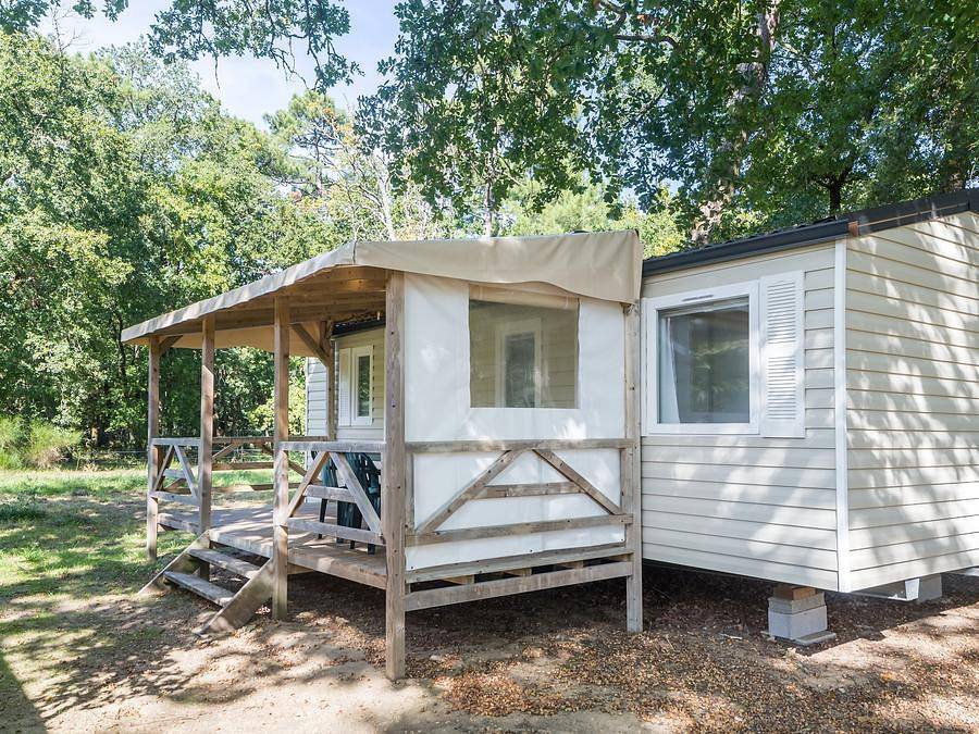 Camping Marvilla Parks - La Pinède - Mobile home 4 persons - Comfort Xl | 2 Bedrooms | 4 Pers. | Raised terrace | Tv in Les Mathes, Côte de Beauté