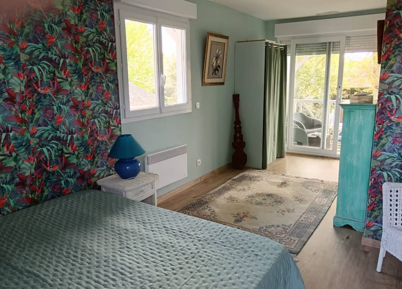 Chambre d’hôtes « La Nomade - Chambre Tahitienne » avec piscine partagée, terrasse privée et Wi-Fi in Andernos-les-Bains, Région d'Arcachon