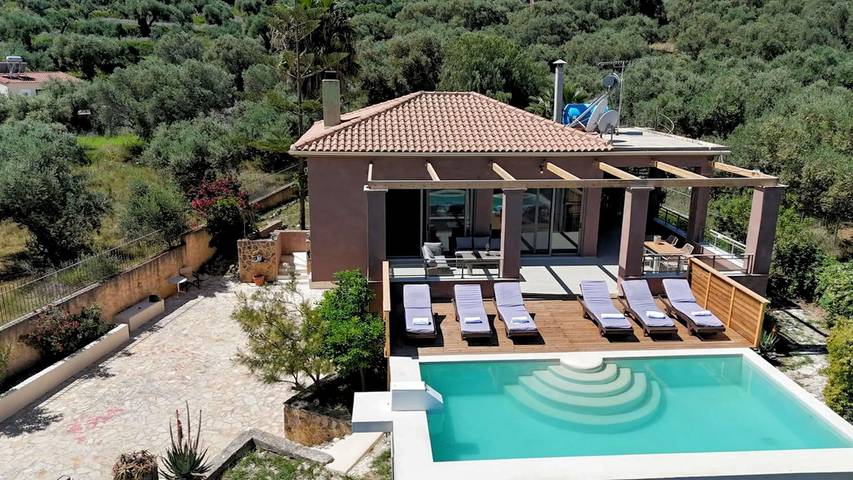 Διαμερίσματα διακοπών για 10 άτομα, με κήπο και πισίνα καθώς και θέα στον ωκεανό στη Μπόχαλη