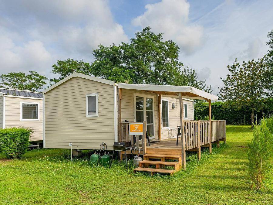 Camping Le Riva Bella  - Bungalow 4 personen - Mobilheim | Comfort | 2 Zi. | 4 Pers. | Erhöhte Terrasse | Klimaanlage | TV in Ouistreham, Caen und Umgebung