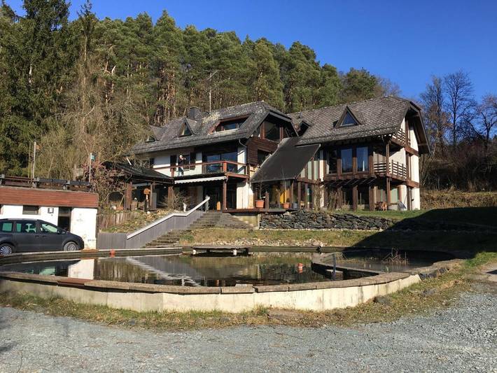Ferienwohnung für 4 Personen, mit Balkon und Garten sowie Seeblick und Ausblick in Usingen