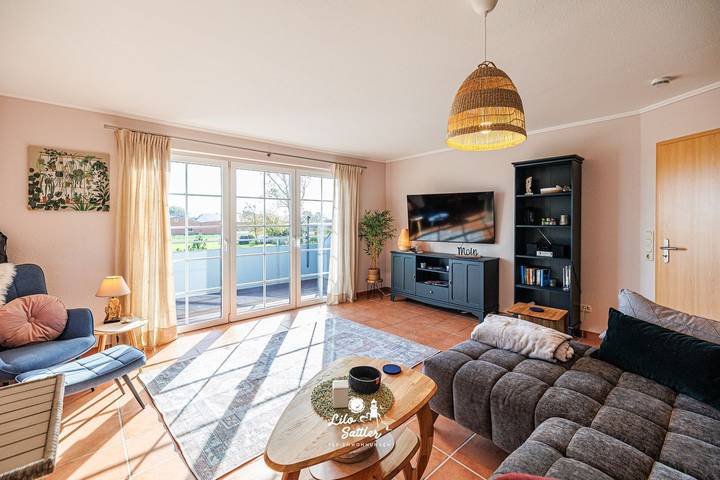 Ferienwohnung für 4 Personen, mit Balkon und Ausblick in Westerdeichstrich