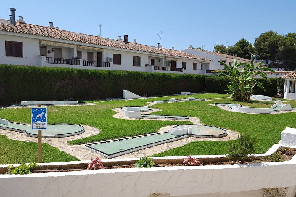 Entire apartment, Apartment with private terrace and garden facing the pool and next to the beach in Alcossebre, Alcalà de Xivert