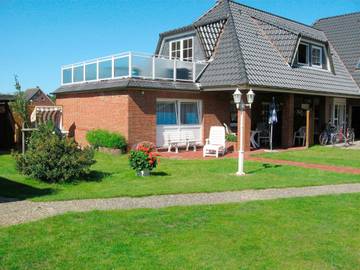 Ferienwohnung für 2 Personen, mit Terrasse und Pool sowie Garten in Wittdün