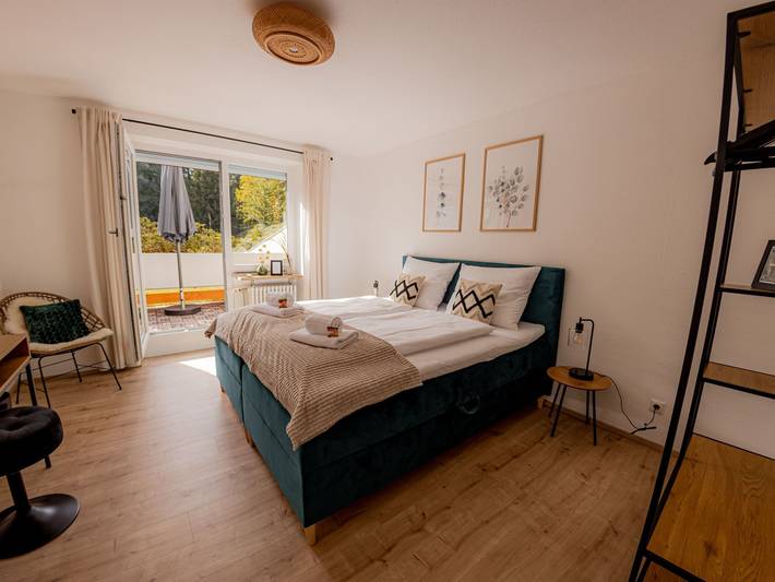Ferienwohnung für 4 Personen, mit Balkon und Terrasse sowie Garten