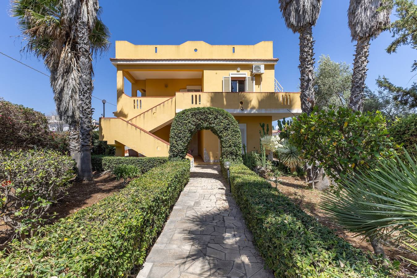 Appartement entier, Appartement "Preside Vista Giardino" avec jardin partagé, Wi-Fi et climatisation in Spiaggia di Eloro, Lido di Noto