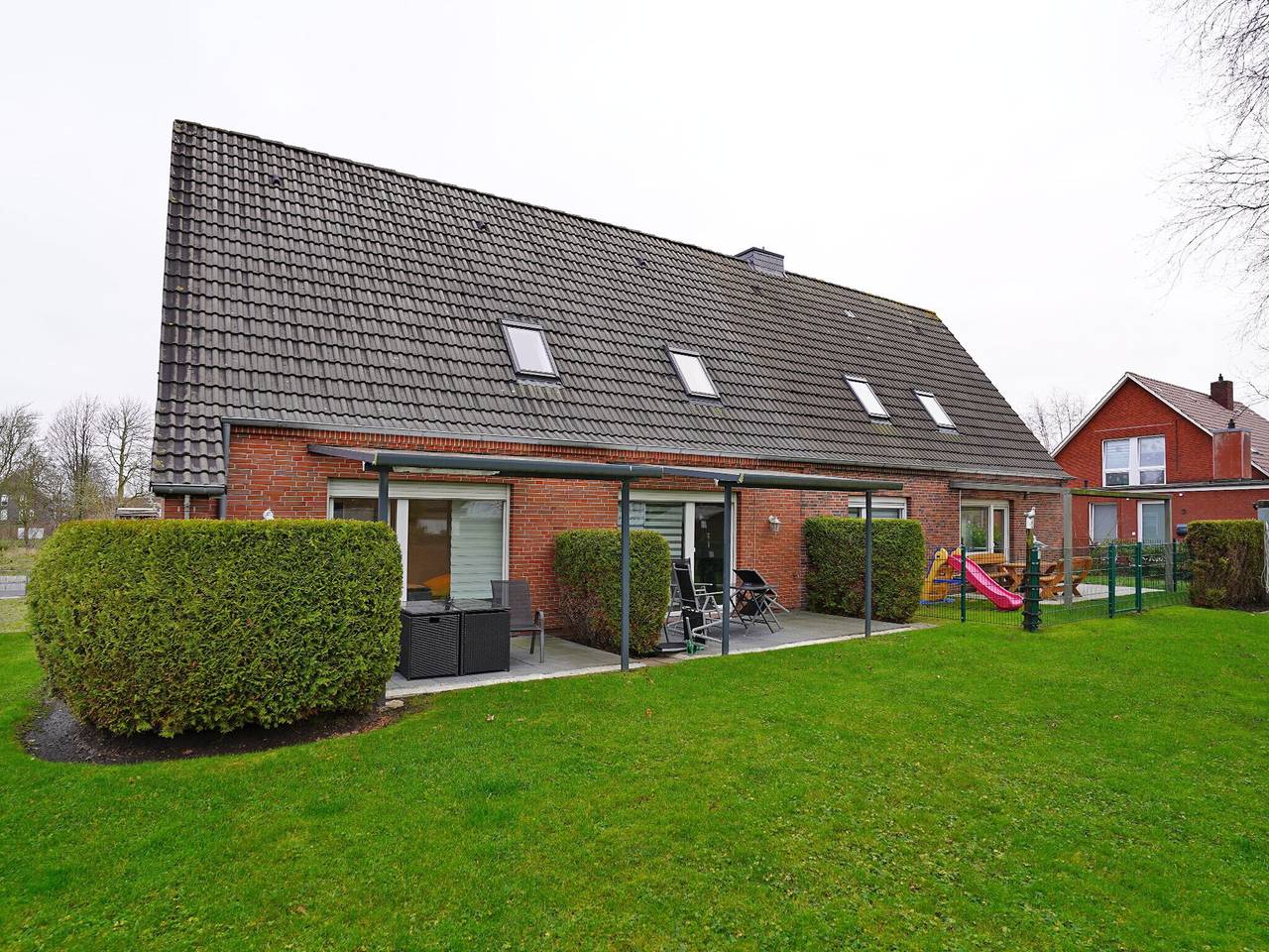 Geheel appartement, Appartement 'Wattwurm' met gedeelde tuin en Wi-Fi in Norddeich, Norden en omgeving