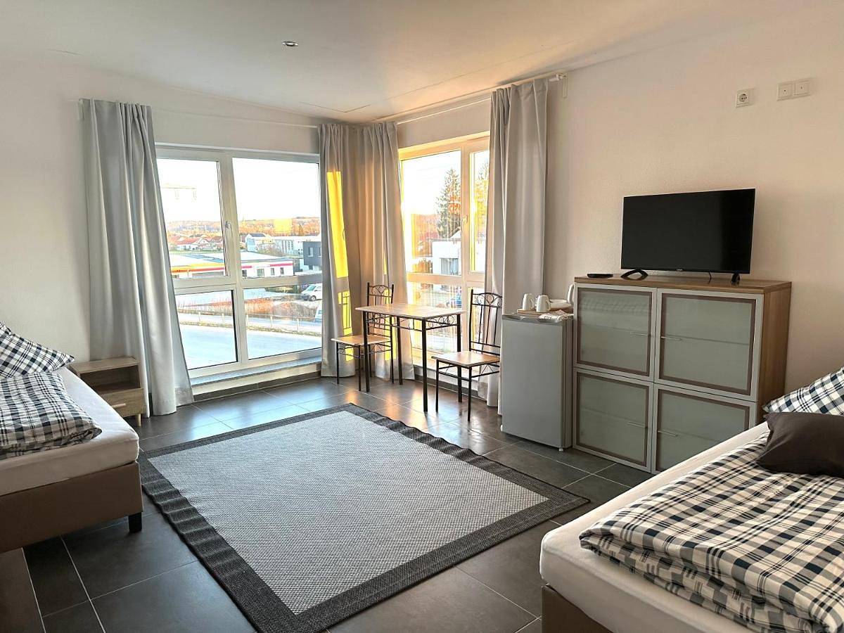 Appartement de vacances entier, Gemütliches Doppelzimmer Gemeinschaftsbad in Dingolfing, Bavière Orientale