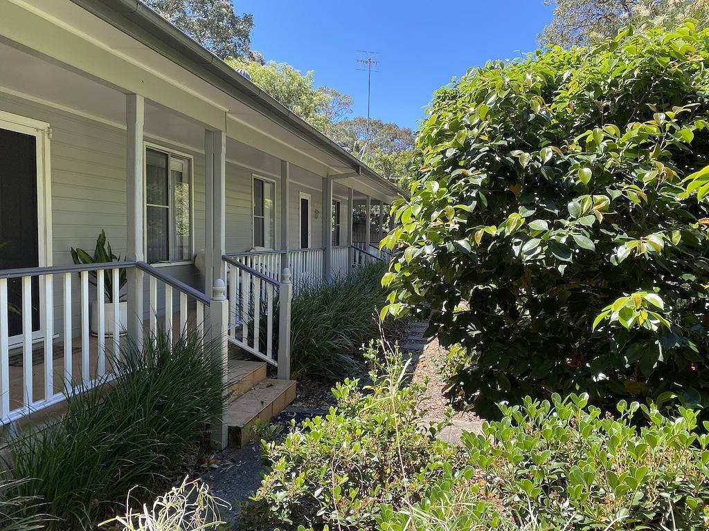 Pearl Bliss, a sundrenched, secluded oasis 200m from spectacular Pearl Beach in Pearl Beach, New South Wales