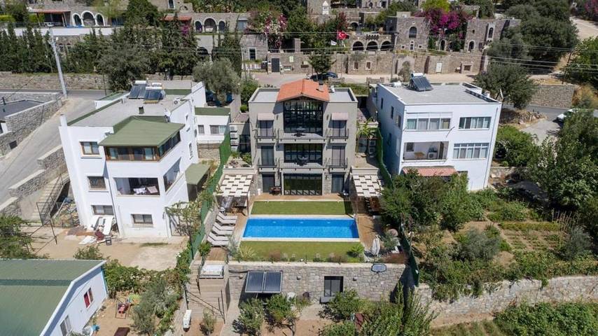 Villa pour 14 personnes, avec piscine ainsi que jardin et balcon à Bodrum