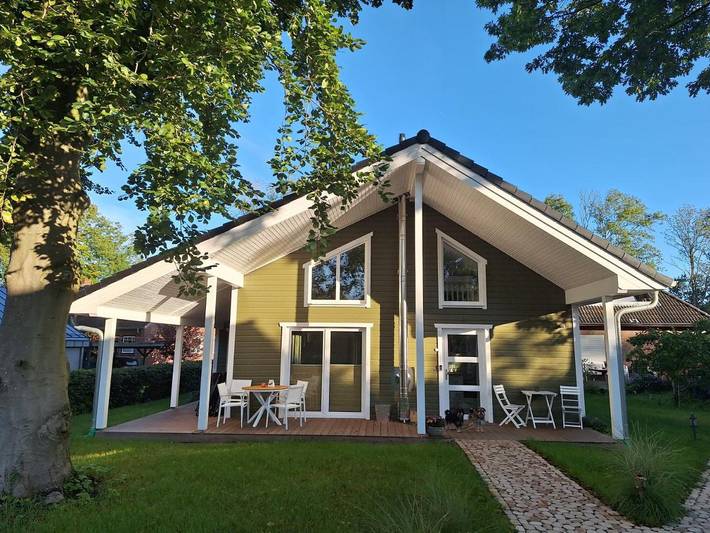 Ferienhaus für 4 Personen, mit Terrasse und Garten sowie Seeblick und Ausblick in Fockbek