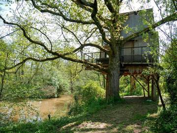 Tente pour 4 personnes, avec vue et vue sur le lac ainsi que piscine et jardin en Gironde