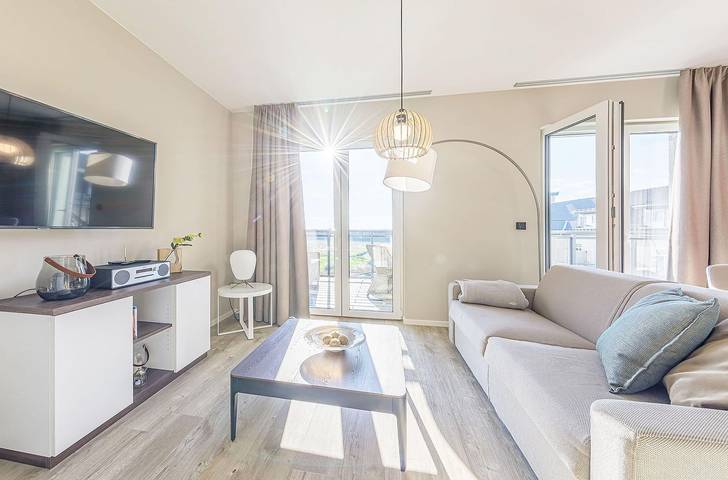 Ferienwohnung für 4 Personen, mit Balkon und Sauna sowie Seeblick in Wustrow