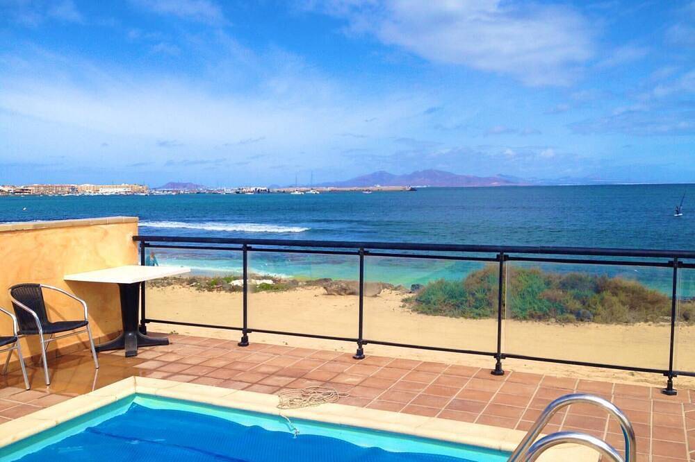 Schöne Villa am Strand. Privatepool, atemberaubender Meer- und Inselblick in Corralejo, La Oliva