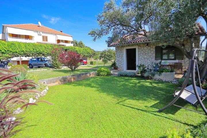 Pension voor 3 personen, with terras and uitzicht as well as tuin in Zadar