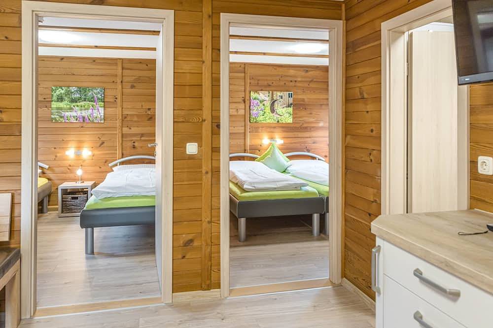 Ganze Wohnung, Gemütliches Blockhaus (72 m2) mit Terrasse und Liegewiese in Burglengenfeld, Ostbayern