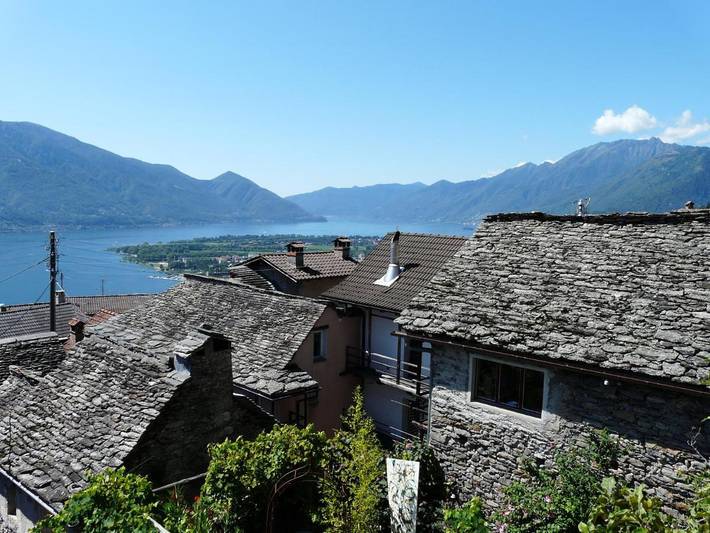 Ferienwohnung für 3 Personen, mit Terrasse und Garten sowie Seeblick und Ausblick