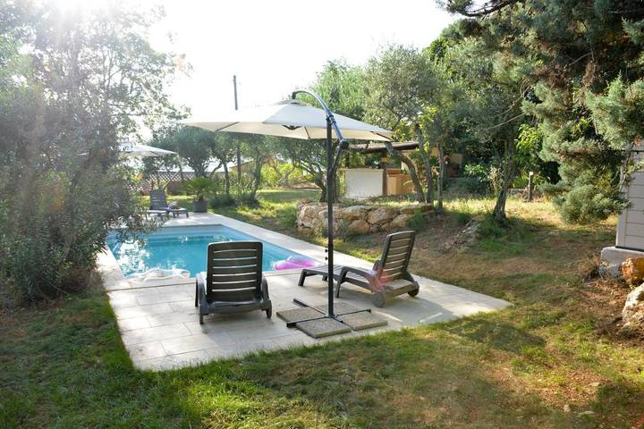 Appartement de vacances pour 4 personnes, avec piscine et jardin