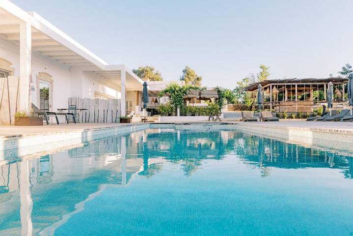 Bungalow para 2 pessoas, com piscina infantil e jardim e ainda piscina and vista em Ria Formosa