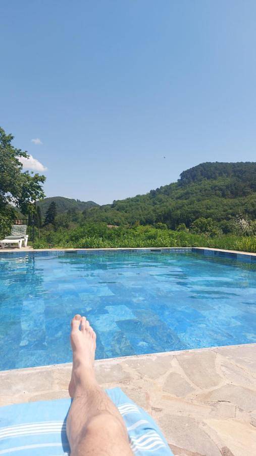 Appartement de vacances pour 4 personnes, avec jardin ainsi que vue et piscine