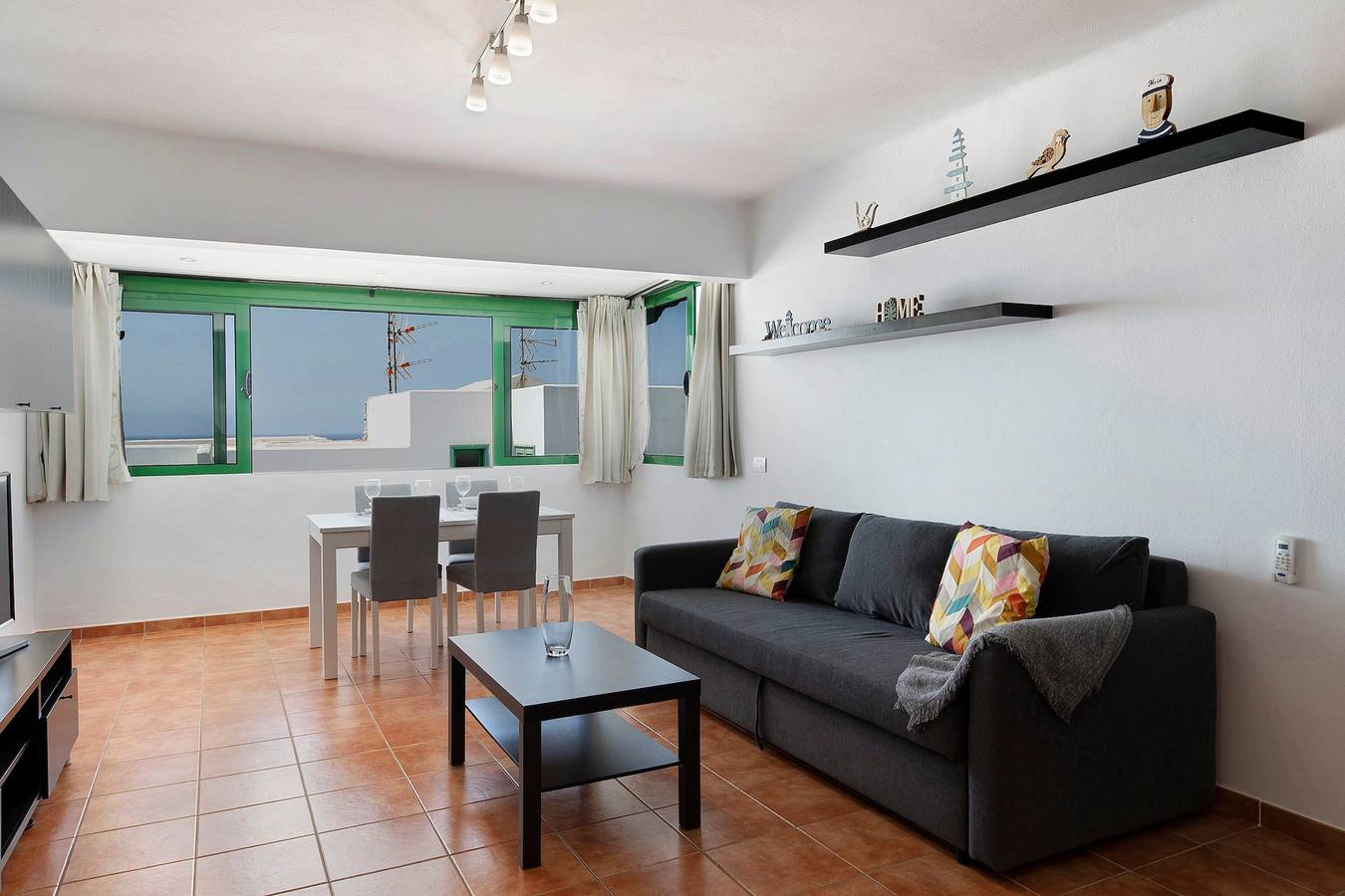 Entire apartment, Vacation Home Portonovo Relax - Puerto del Carmen with Sea View, Shared Pool & Wi-Fi in Puerto del Carmen, Tías