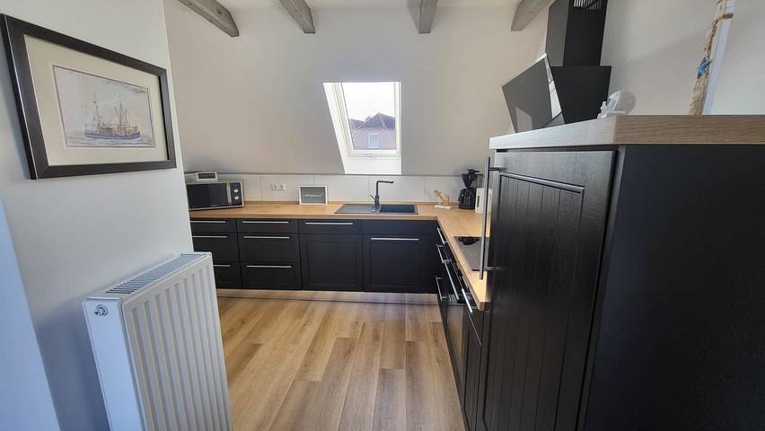 Ferienhaus für 4 Personen, mit Terrasse und Garten sowie Sauna und Ausblick in Pilsum - 2