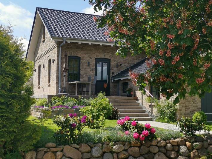 Ferienhaus für 4 Personen, mit Balkon und Terrasse sowie Garten und Sauna