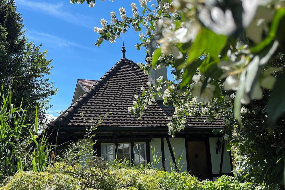 Romantic oasis with fireplace near mountains in Unterseen, Lake Thun