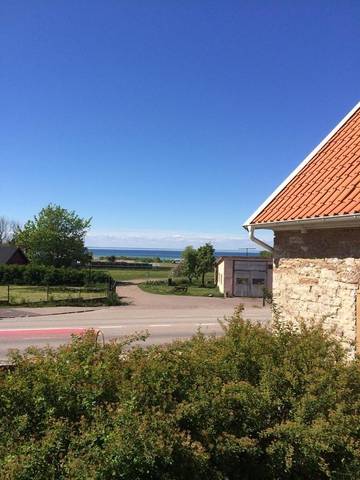 Ferienwohnung für 3 Personen, mit Seeblick und Garten sowie Ausblick in Köpingsvik