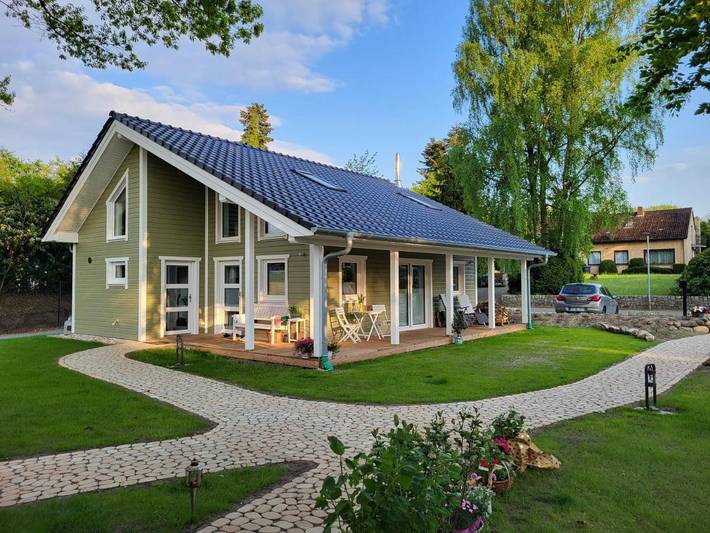Ferienhaus für 4 Personen, mit Terrasse und Garten sowie Seeblick und Ausblick in Fockbek
