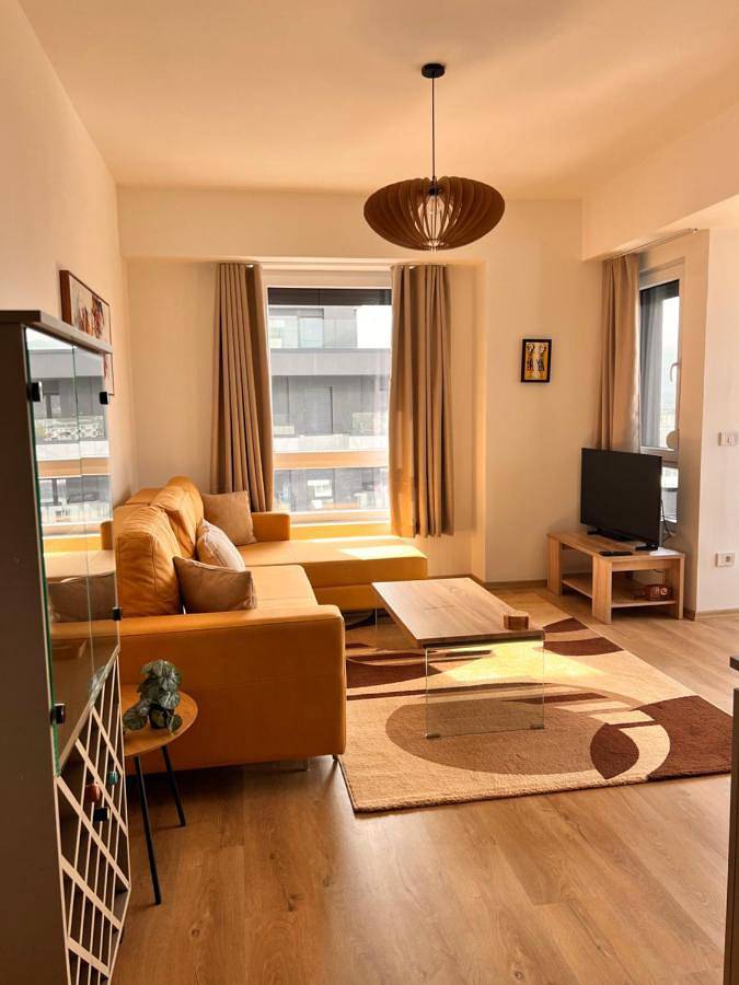 Appartement de vacances pour 4 personnes, avec Balcon et Terrasse ainsi que Jardin et Vue sur le lac