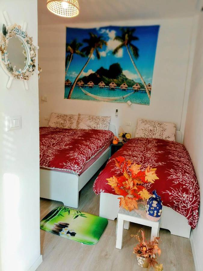 Ferienwohnung für 3 Personen, mit Ausblick und Garten sowie Pool in Grado