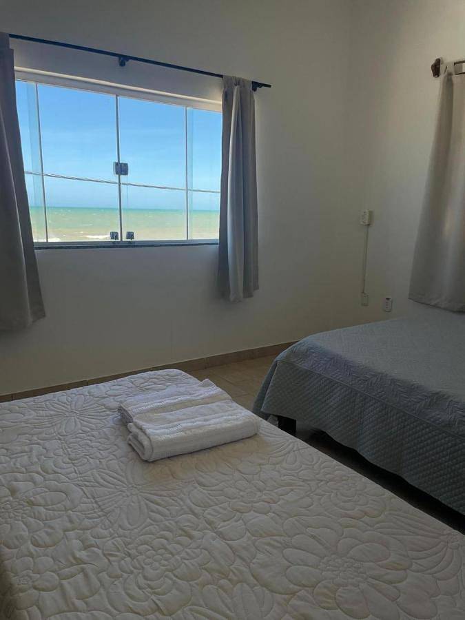 Pousadas para 4 pessoas, com vista e piscina e ainda jardim and balcão em Mucuri