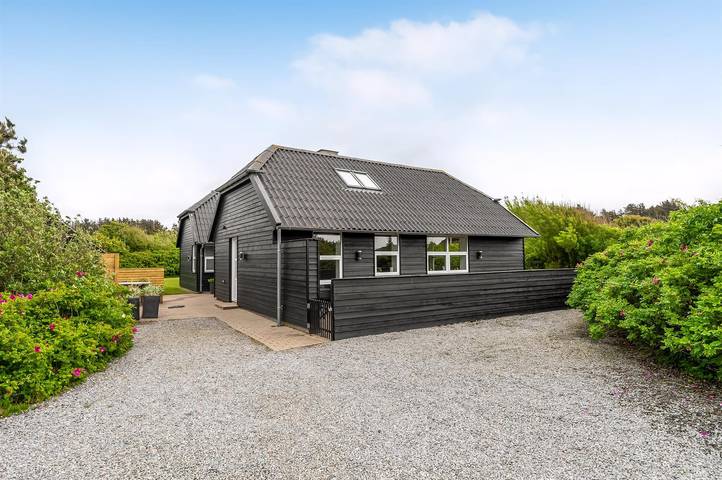 Ferienhaus für 8 Personen, mit Terrasse und Sauna sowie Whirlpool in Nørlev Strand