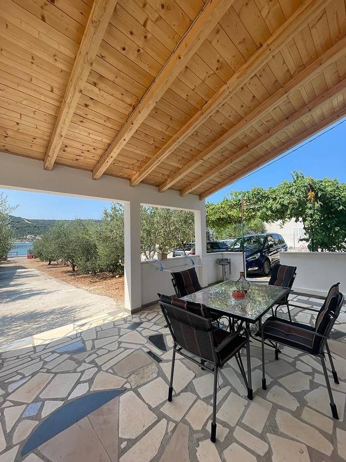 Ferienhaus für 4 Personen, mit Meerblick und Balkon/Terrasse sowie Garten