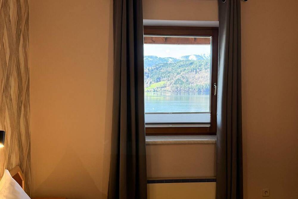Ganze Wohnung, Ferienwohnungen Seerose am See - Appartement / 2 getrennte Schlafräume (2.Etage) in Millstatt, Bezirk Spittal an der Drau