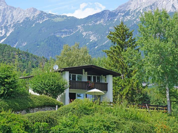 Ferienhaus für 4 Personen, mit Garten und Ausblick sowie Sauna