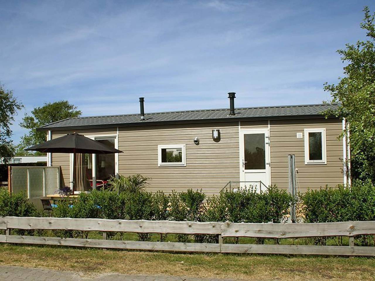 Charmant duinchalet tussen golfbaan en strand in Hollum, Nederlandse waddeneilanden