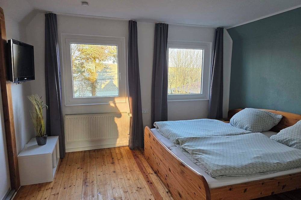 Ferienhaus Windschief direkt hinterm Deich mit großem Garten, Wlan, Kamin in Nordholz, Cuxland