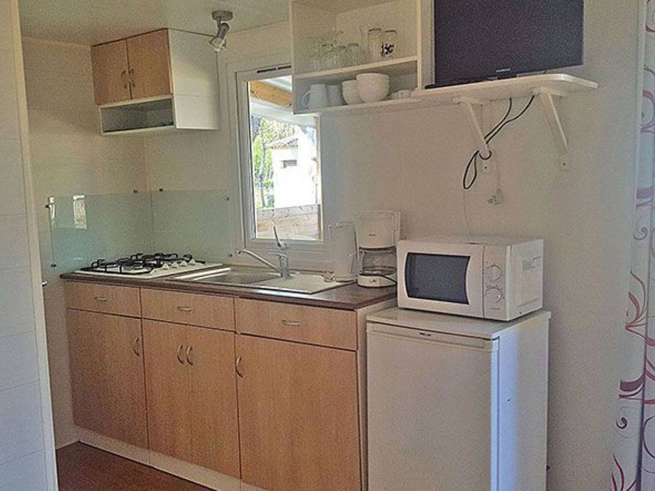 Acogedor mobil-home con terraza - 4 pers. in Anduze, Cevenas
