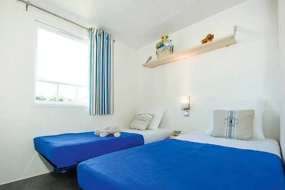 Mobil-home | Classic | 2 Ch. | 4 pers. | Terrasse surélevée non couverte in Saint-Julien-des-Landes, Vallée de la Loire
