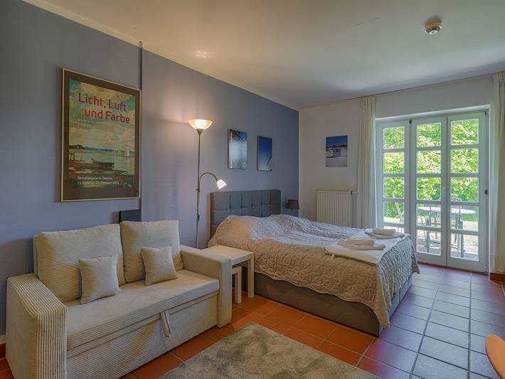 Ferienwohnung für 2 Personen, mit Terrasse und Garten sowie Kinderpool und Sauna in Dranske