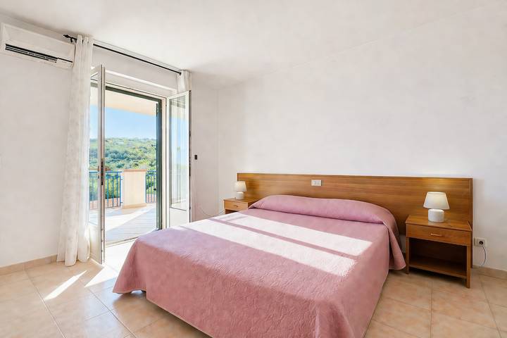 Location de vacances pour 2 personnes, avec balcon et jardin en Italie